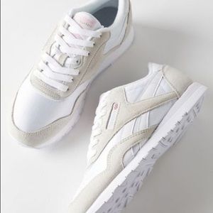 Reebok sneakers. They look so good with tights or work pants for a casual look.